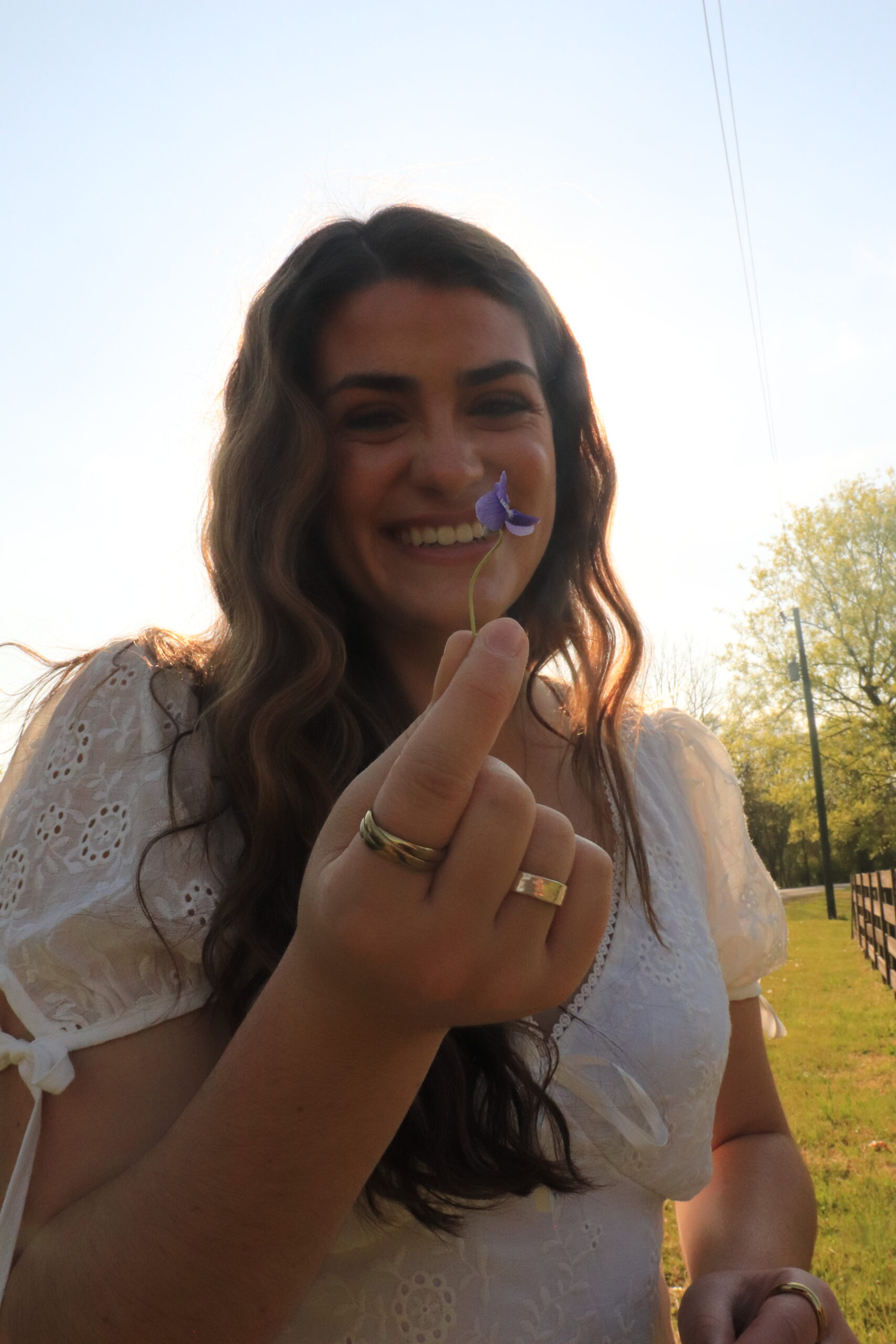 Chelsea Speranza holding purple flower